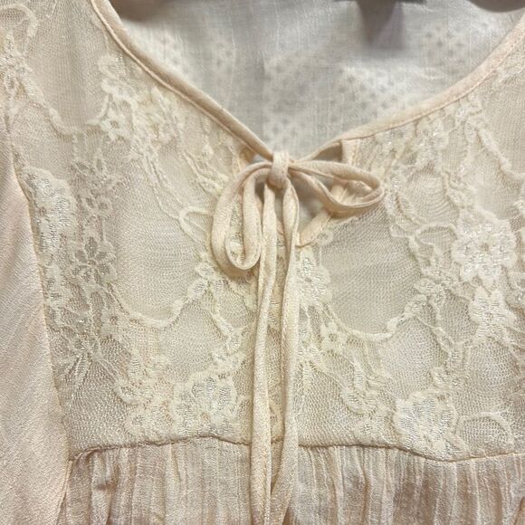 Cream Bell Sleeve Blouse with Tie Front and Asymmetrical Design - Picture 4 of 4